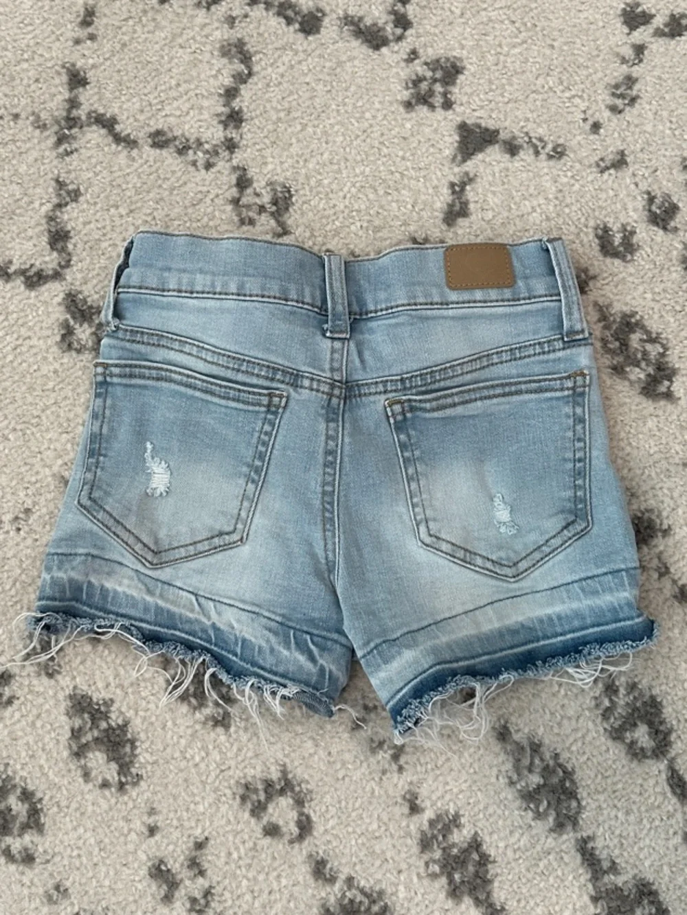 Celebrity Pink Light Wash Denim Frayed Hem Shorts